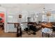 Second floor living room showcasing railings, carpeted floor, sofas and windows at 1905 Buford Ct, Conyers, GA 30094