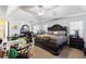 Bright main bedroom with large windows, a king-size bed, and a spacious walk-in closet at 1905 Buford Ct, Conyers, GA 30094