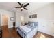 This bedroom is spacious, with hardwood floors and an ensuite bathroom at 4046 Hazel Nut Ln, Atlanta, GA 30342