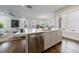 Open layout of kitchen with a center island that flows naturally to the living area at 4046 Hazel Nut Ln, Atlanta, GA 30342