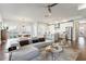 Bright open-plan living and dining area featuring hardwood floors and a seamless flow for entertaining at 4046 Hazel Nut Ln, Atlanta, GA 30342