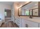 Bright bathroom with double vanity, quartz counters, and modern fixtures at 1482 Alcovy Station Rd, Covington, GA 30014