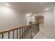 Second-floor hallway boasting plush carpeting and classic trim details at 1482 Alcovy Station Rd, Covington, GA 30014