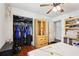 Bedroom featuring an open closet and standard ceiling fan at 309 Carmen Ct, Lawrenceville, GA 30046