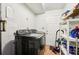 Laundry room featuring a washer and dryer, with shelving for storage at 309 Carmen Ct, Lawrenceville, GA 30046