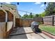 Cozy backyard patio with a grill and a privacy fence, perfect for outdoor dining at 3872 Francis Dr, Powder Springs, GA 30127