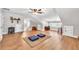 Bright bonus room with wood floors, vaulted ceiling, and windows, with plenty of space at 399 Chestnut St, Social Circle, GA 30025