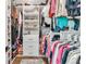 Well-organized walk-in closet with custom shelving and ample storage space at 399 Chestnut St, Social Circle, GA 30025