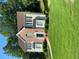 Charming two-story home with brick and vinyl siding and meticulously maintained landscaping at 665 Somerset Vale Dr, Lawrenceville, GA 30044