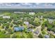 Aerial view of the Loganville, GA neighborhood showing location, roads, and surrounding green trees at 3135 Castlewood Dr, Loganville, GA 30052