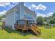 Beautiful backyard featuring a wooden deck with gazebo, ideal for outdoor entertaining and relaxation at 3135 Castlewood Dr, Loganville, GA 30052