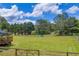 Expansive backyard featuring a deck and a swing set at 3135 Castlewood Dr, Loganville, GA 30052