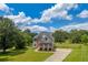 Well-maintained two-story brick home with large yard, perfect for Gathering living at 3135 Castlewood Dr, Loganville, GA 30052