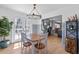 Dining room with an elegant light fixture and french doors to the back patio at 4304 Lake Laurel Se Dr, Smyrna, GA 30082