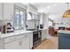 Well-lit kitchen boasts modern stainless steel appliances and ample counter space at 4304 Lake Laurel Se Dr, Smyrna, GA 30082