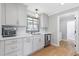 Bright, updated kitchen featuring sleek countertops, modern appliances, and hardwood floors at 4304 Lake Laurel Se Dr, Smyrna, GA 30082