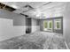 Spacious basement area with walk-out access to the yard, offering natural light at 821 Hood Rd, Fayetteville, GA 30214