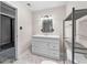 Bathroom featuring a modern vanity, ample storage, and stylish fixtures at 821 Hood Rd, Fayetteville, GA 30214