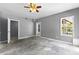 Light-filled bedroom with a large window, offering natural light and outdoor views at 821 Hood Rd, Fayetteville, GA 30214