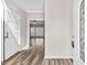 Bright foyer with wood flooring and a view into the adjacent living spaces at 821 Hood Rd, Fayetteville, GA 30214