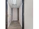 Hallway with practical design, showcasing access to utilities and other functional areas at 821 Hood Rd, Fayetteville, GA 30214