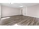 A spacious living room with hardwood floors and neutral walls at 821 Hood Rd, Fayetteville, GA 30214
