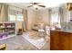 Charming Bedroom with a crib, soft rug, and plenty of natural light at 5327 David Cir, Covington, GA 30014