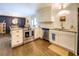 Stylish kitchen featuring stainless steel appliances, tile backsplash, and modern cabinetry at 5327 David Cir, Covington, GA 30014