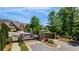 View of the community entrance featuring brick pillars and wrought iron gates at 5850 Overlook Rdg, Suwanee, GA 30024