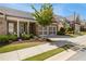 Attractive brick home with a two-car garage, complemented by green lawns and mature landscaping at 5850 Overlook Rdg, Suwanee, GA 30024