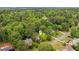 Aerial view of a wooded neighborhood showcasing the home's location and surroundings at 685 Maplelake Dr, Acworth, GA 30101