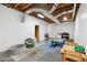 Basement featuring concrete floor, open exposed ceiling, play area, and unfinished walls ready for customization at 685 Maplelake Dr, Acworth, GA 30101