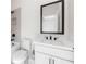 Modern bathroom featuring a white vanity, toilet, and tub/shower with matte black fixtures at 17145 River Overlook Dr, Roswell, GA 30075