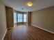 Bedroom features three large windows for great natural light at 1745 Collines Sw Ave, Atlanta, GA 30331