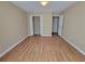 Bedroom features wood floors and standard closet at 1745 Collines Sw Ave, Atlanta, GA 30331