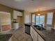 Well-appointed kitchen featuring granite countertops, stainless appliances, and a convenient breakfast bar at 1745 Collines Sw Ave, Atlanta, GA 30331