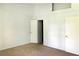 Neutral bedroom with two closets and plush carpet flooring at 1807 Queen Anne Ct, Sandy Springs, GA 30350