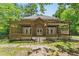 View of house with a large deck featuring a pergola-covered outdoor entertaining space at 2068 Signal Ridge Nw, Kennesaw, GA 30152