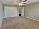 Spacious bedroom with neutral carpet and large closet space at 2068 Signal Ridge Nw, Kennesaw, GA 30152