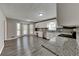 Bright kitchen with white cabinets, stone countertops, and a large bay window at 2068 Signal Ridge Nw, Kennesaw, GA 30152
