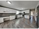 Modern kitchen featuring white cabinets, granite countertops, and stainless steel appliances at 2068 Signal Ridge Nw, Kennesaw, GA 30152