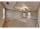 Large main bedroom featuring neutral walls, tray ceiling, and ensuite bath at 2068 Signal Ridge Nw, Kennesaw, GA 30152