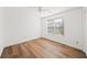 Bright bedroom with hardwood floors and a ceiling fan at 3652 Platina Park Ct, Decatur, GA 30034