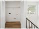 Upstairs closet with new floors and bi-fold doors at 3652 Platina Park Ct, Decatur, GA 30034