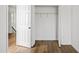 Walk-in closet with open doors and hardwood floors at 3652 Platina Park Ct, Decatur, GA 30034