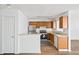 Functional kitchen with stainless steel appliances and wood cabinetry at 3652 Platina Park Ct, Decatur, GA 30034