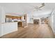 Inviting living area with modern flooring, kitchen pass-through and cozy fireplace at 3652 Platina Park Ct, Decatur, GA 30034