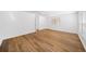 Spacious living room features modern wood flooring and multiple windows at 3652 Platina Park Ct, Decatur, GA 30034