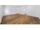Open concept living area with gorgeous floors, white walls, and natural light at 3652 Platina Park Ct, Decatur, GA 30034
