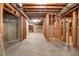 Unfinished basement with exposed wood framing and ductwork at 6030 Sweet Creek Rd, Duluth, GA 30097
